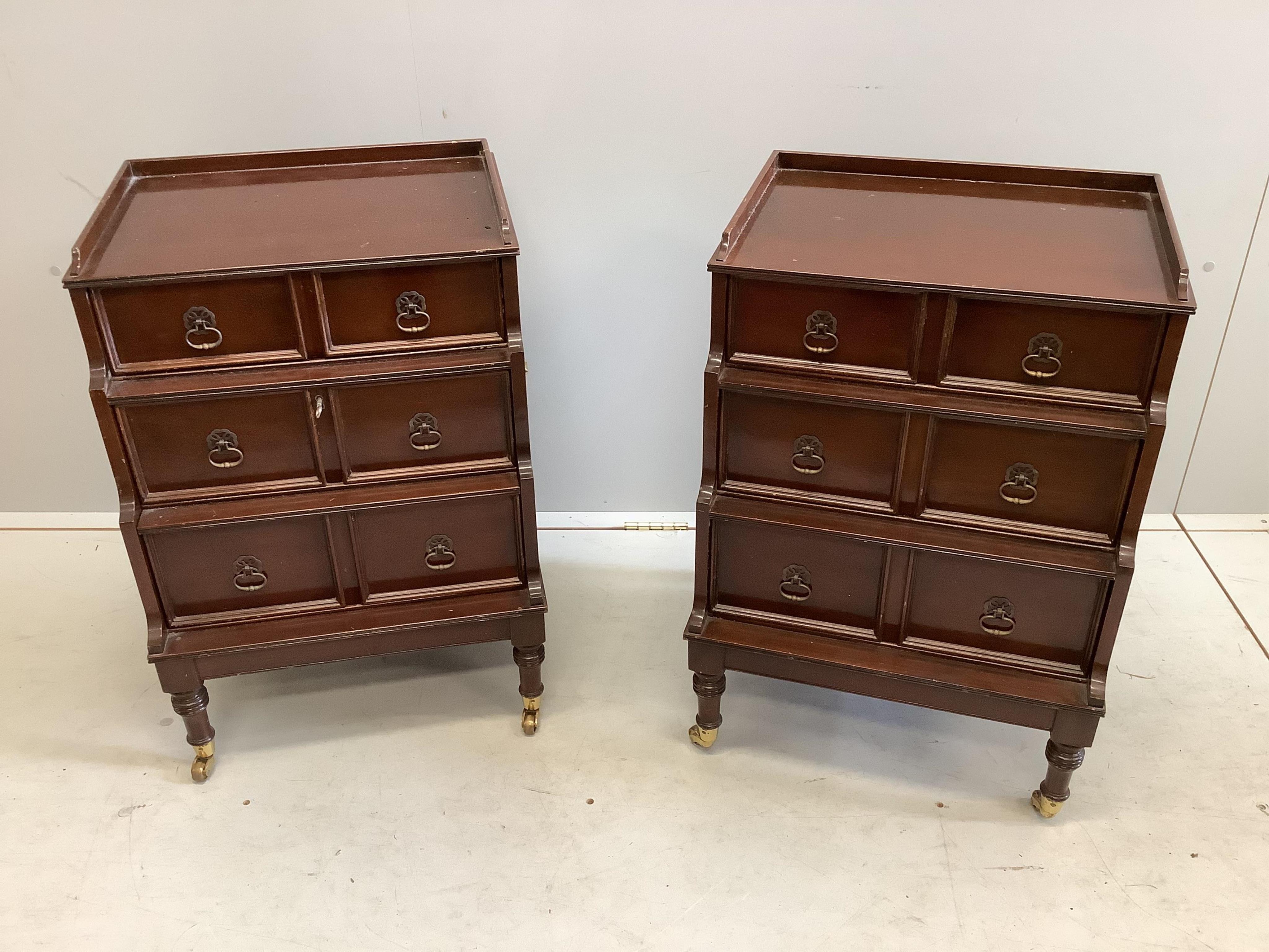 A pair of reproduction mahogany small chests, one with filing drawer, width 48cm, depth 43cm, height 69cm